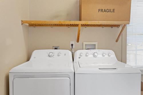 two white machines in a room with a box at 8046 - Sun Runner in Rodanthe
