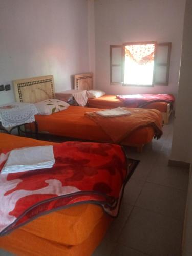 Ein Bett oder Betten in einem Zimmer der Unterkunft Ecogite La Tourterelle - B&B