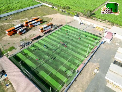 an aerial view of a tennis court in a parking lot at La Casa Redonda - Supe in Barranca
