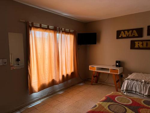 Ein Bett oder Betten in einem Zimmer der Unterkunft Apart Suipacha