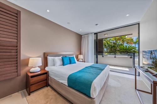 Una cama o camas en una habitación de Mirage Whitsundays