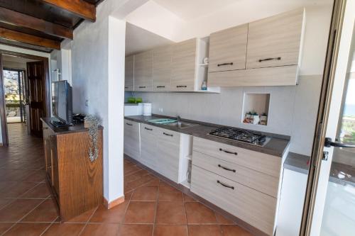 Kuchyň nebo kuchyňský kout v ubytování Casa dell'infinito