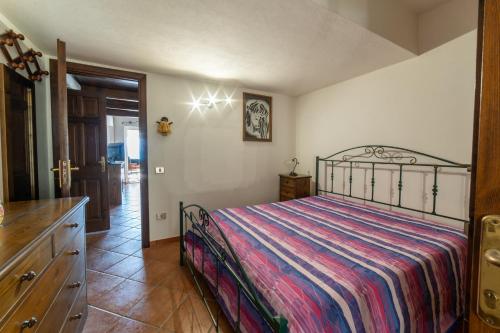 Postel nebo postele na pokoji v ubytování Casa dell'infinito