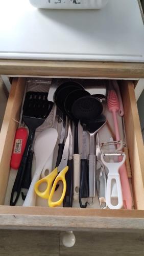 a drawer filled with lots of kitchen utensils at BRUCE Luxury House in Izumi-Sano