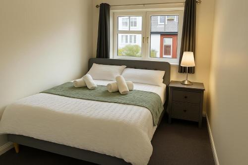 Ένα ή περισσότερα κρεβάτια σε δωμάτιο στο Elegant 2 Bed-Ground Floor