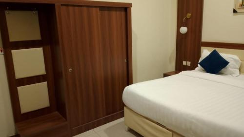 Postel nebo postele na pokoji v ubytování المبيت 3 للشقق المخدومه