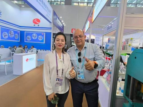 a man and a woman standing in a store at HOTEL VIP 46 SSQS in Bagua Grande