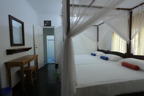 Katil atau katil-katil dalam bilik di City Tourist Rest