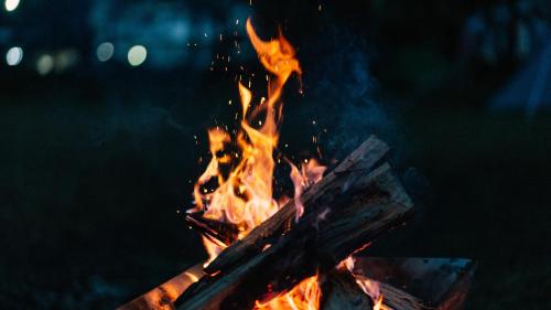 a fire in a grill with flames at Kitakaruizawa Morino Bessou NO8 in Tsumagoi
