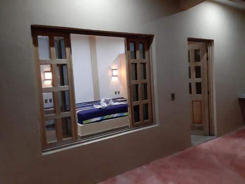 Postel nebo postele na pokoji v ubytování Casa Emir