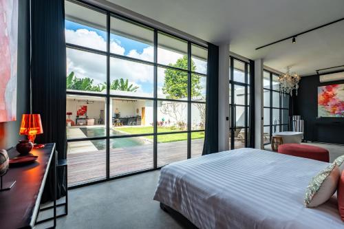 Ένα ή περισσότερα κρεβάτια σε δωμάτιο στο Rouge - Loft Cinta