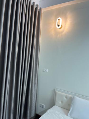 Postel nebo postele na pokoji v ubytování Phòng trọ bình dân