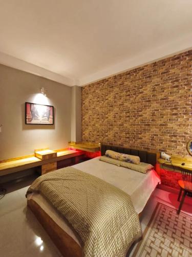 Katil atau katil-katil dalam bilik di Long Homestay Xuyên Á - Hotels