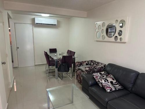 Zona de estar de Casa Flamingo 3 Recamaras, 3 Baños completos