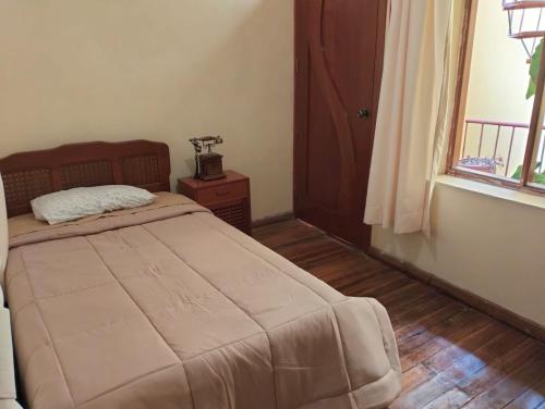 En eller flere senge i et værelse på La Casa de Lily