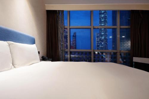 Katil atau katil-katil dalam bilik di CHECK inn Taipei Xinyi