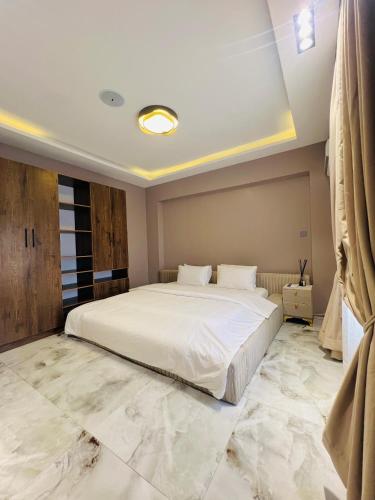 Postel nebo postele na pokoji v ubytování VIO Luxury Homes