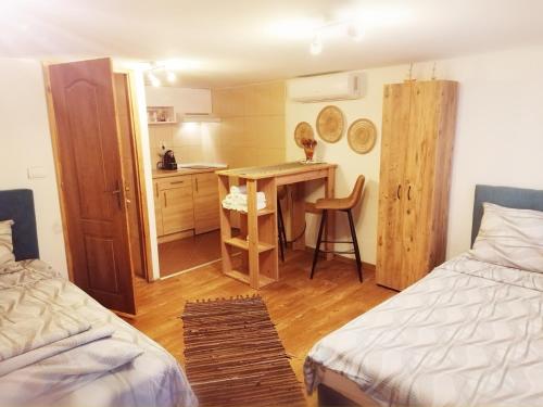 Postel nebo postele na pokoji v ubytování Apartman Vrh 88