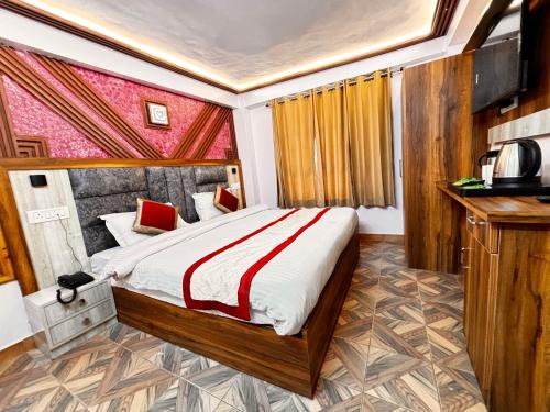 Ein Bett oder Betten in einem Zimmer der Unterkunft Hotel Shail