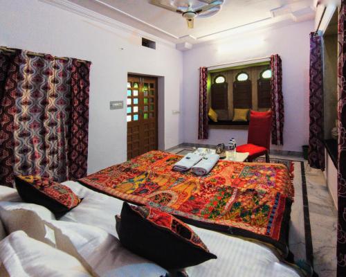 Postel nebo postele na pokoji v ubytování Little Jaisal - Boutique Hotel
