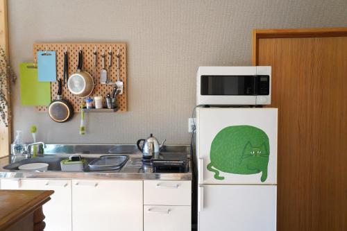 Kuchyň nebo kuchyňský kout v ubytování guesthouse goma