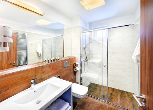 Un baño de Hotel Aqualand Inn