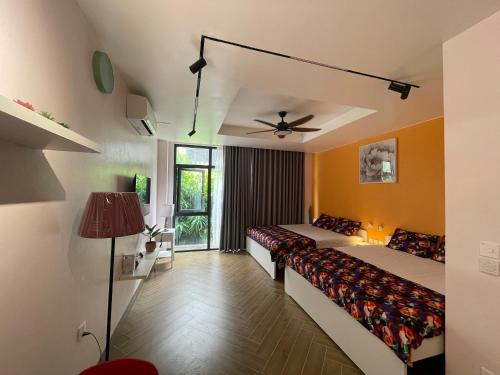 Postel nebo postele na pokoji v ubytování Lighting Villa OCP - Ocean Park Full tiện nghi View đẹp