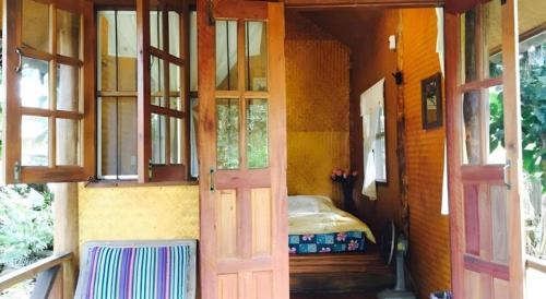 Postel nebo postele na pokoji v ubytování Chiang Dao Hut