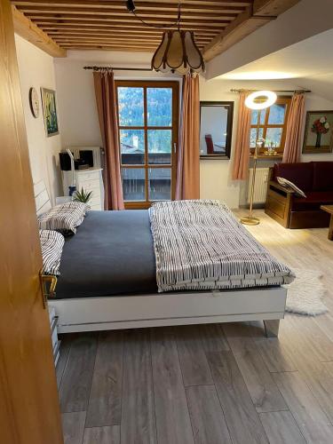 Postel nebo postele na pokoji v ubytování Feriendorf Adalbert Stifter mit Schwimmbad und Sauna