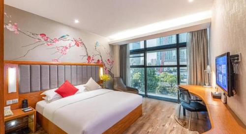 Postel nebo postele na pokoji v ubytování Pae Hotel Suzhou Jinjihu Industrial Park Central Business District