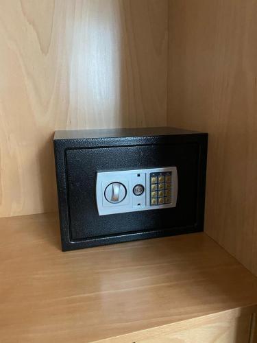 a microwave oven sitting on top of a table at Nile Suites Plaza Hotel Apartments in Cairo