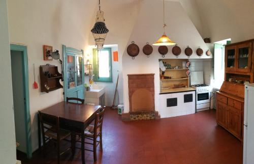 Kuchyň nebo kuchyňský kout v ubytování Antica Masseria pugliese