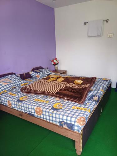 Postel nebo postele na pokoji v ubytování Preeti Resorts