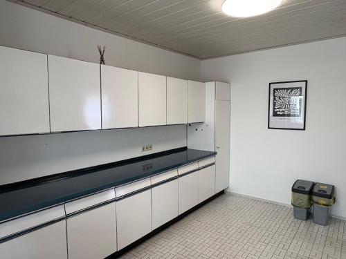 Nhà bếp/bếp nhỏ tại Gruppenapartment mit Wintergarten