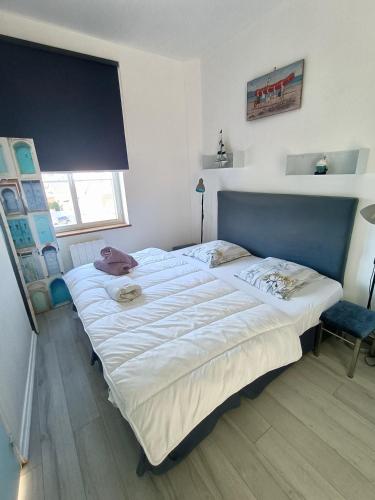 Katil atau katil-katil dalam bilik di L'escale Jolie appartement avec vue mer