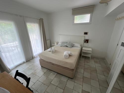 Postel nebo postele na pokoji v ubytování Winahost Apartament Cirerer