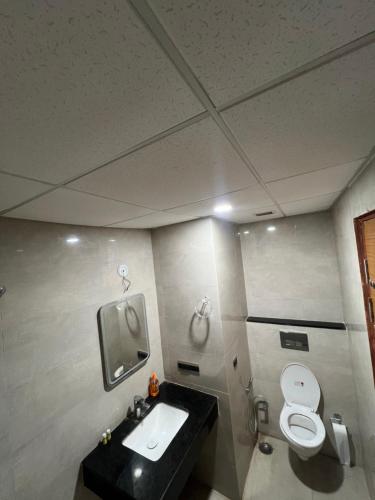 Et badeværelse på Red cottage Stay