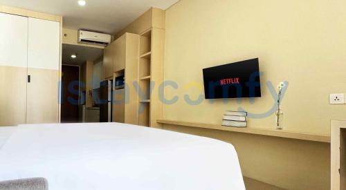 Postel nebo postele na pokoji v ubytování Studio NagoyaThamrinCity Fave Hotel A0631 CityView