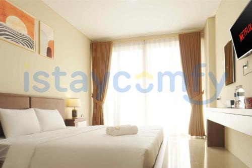 Postel nebo postele na pokoji v ubytování Studio Nagoya Thamrin City Fave Hotel A1202 City View