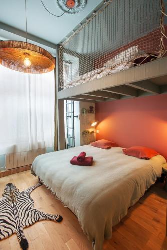 Llit o llits en una habitació de Cozy studio - fully equipped