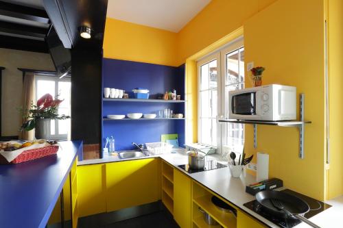 Η κουζίνα ή μικρή κουζίνα στο Bed’nBudget Expo-Hostel Dorms