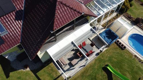 an overhead view of a house with a swimming pool at Rekreační dům Štěpánka in Česká Kubice