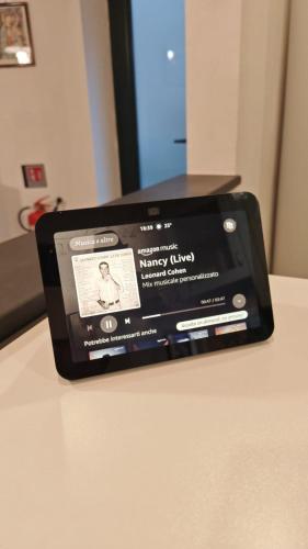 a tablet computer sitting on top of a table at La casa di Giacomo in Portovenere