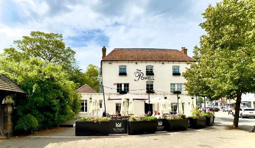 a large white building with a sign on it at The Powell Birchington, Boutique Rooms in Birchington