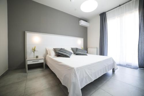 Posteľ alebo postele v izbe v ubytovaní Sikania Casa Diamond