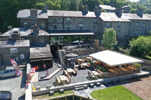 an aerial view of a building with a restaurant at Ty Canol Maentwrog, Snowdonia Nr Zip World in Maentwrog