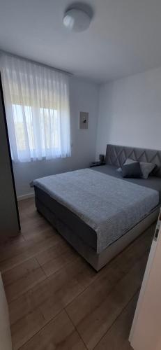 Ένα ή περισσότερα κρεβάτια σε δωμάτιο στο MB House