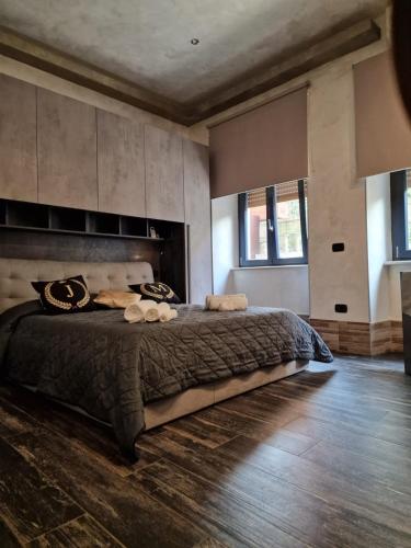 Uma cama ou camas num quarto em Jadore Monic