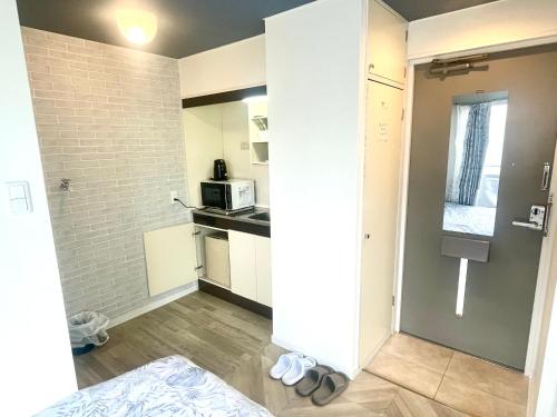 Nhà bếp/bếp nhỏ tại Tokyo Shinjuku East Sunrise House