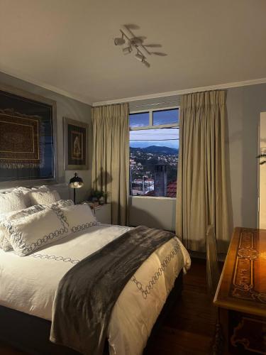 Postel nebo postele na pokoji v ubytování Miguels Seaview Corner